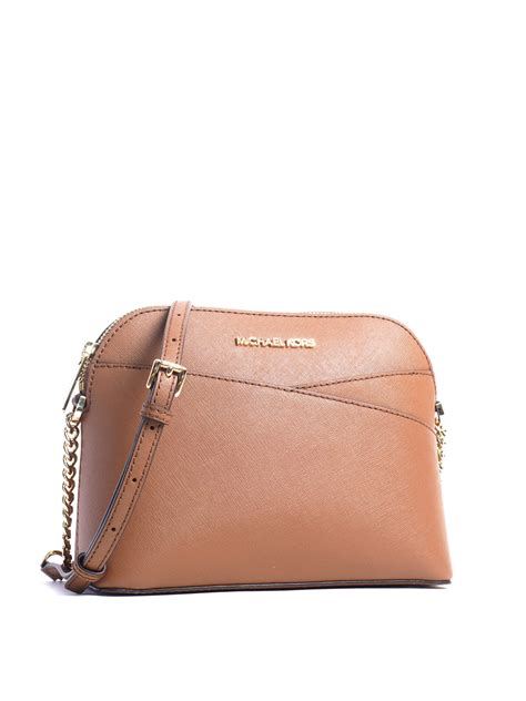 michael kors jet set travel pale gold dome crossbody|More.